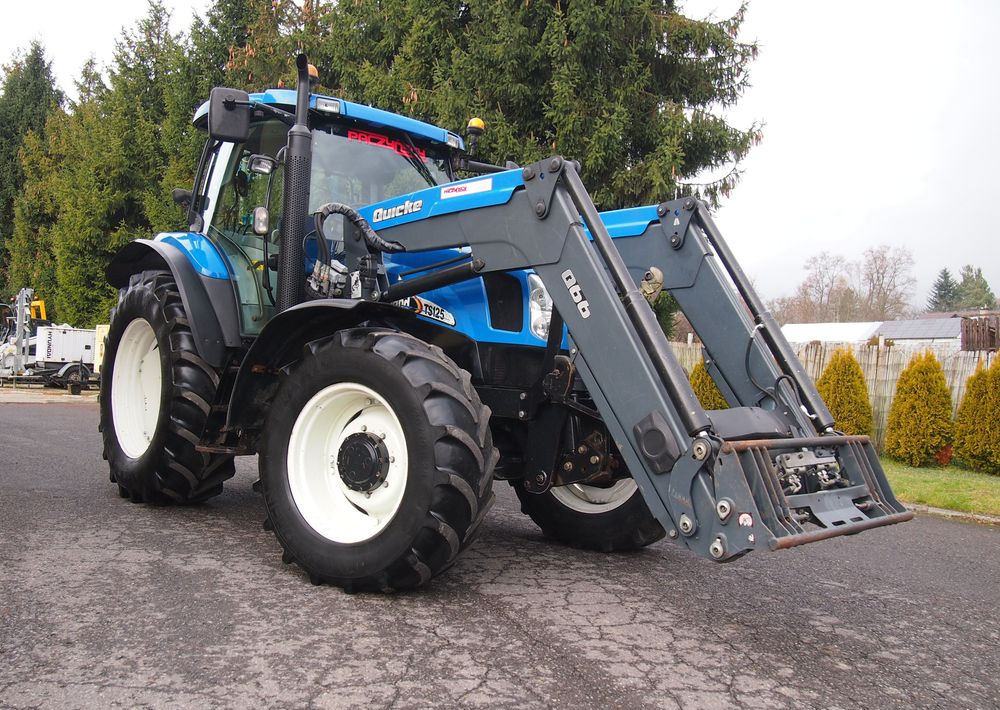 Ciągnik New Holland NH TS125A 6 cylindrów 2004 Ciągnik rolniczy New Holland TS125A - Tracteur agricole: photos 2 Ciągnik New Holland NH TS125A 6 cylindrów 2004 Ciągnik rolniczy New Holland TS125A - Tracteur agricole: photos 2