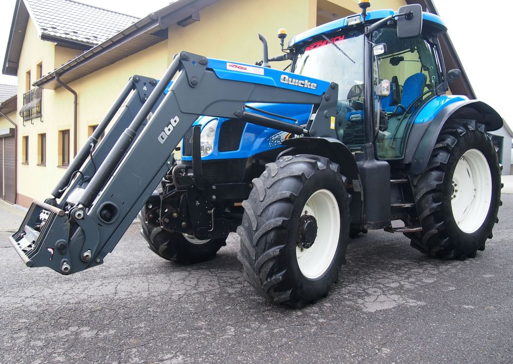 Ciągnik New Holland NH TS125A 6 cylindrów 2004 Ciągnik rolniczy New Holland TS125A - Tracteur agricole: photos 1 Ciągnik New Holland NH TS125A 6 cylindrów 2004 Ciągnik rolniczy New Holland TS125A - Tracteur agricole: photos 1