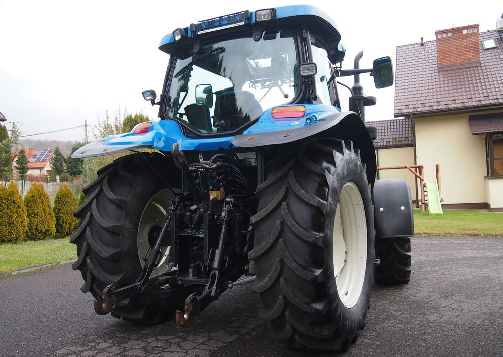 Ciągnik New Holland NH TS125A 6 cylindrów 2004 Ciągnik rolniczy New Holland TS125A - Tracteur agricole: photos 5 Ciągnik New Holland NH TS125A 6 cylindrów 2004 Ciągnik rolniczy New Holland TS125A - Tracteur agricole: photos 5