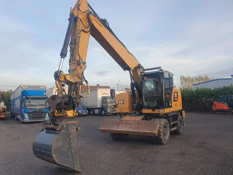 Pelle sur pneus Caterpillar M316F: photos 10