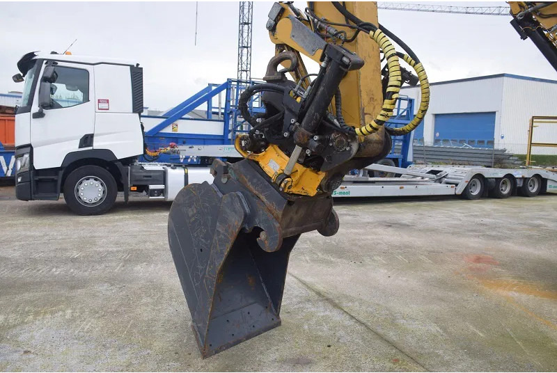 Pelle sur pneus Caterpillar M316F: photos 19