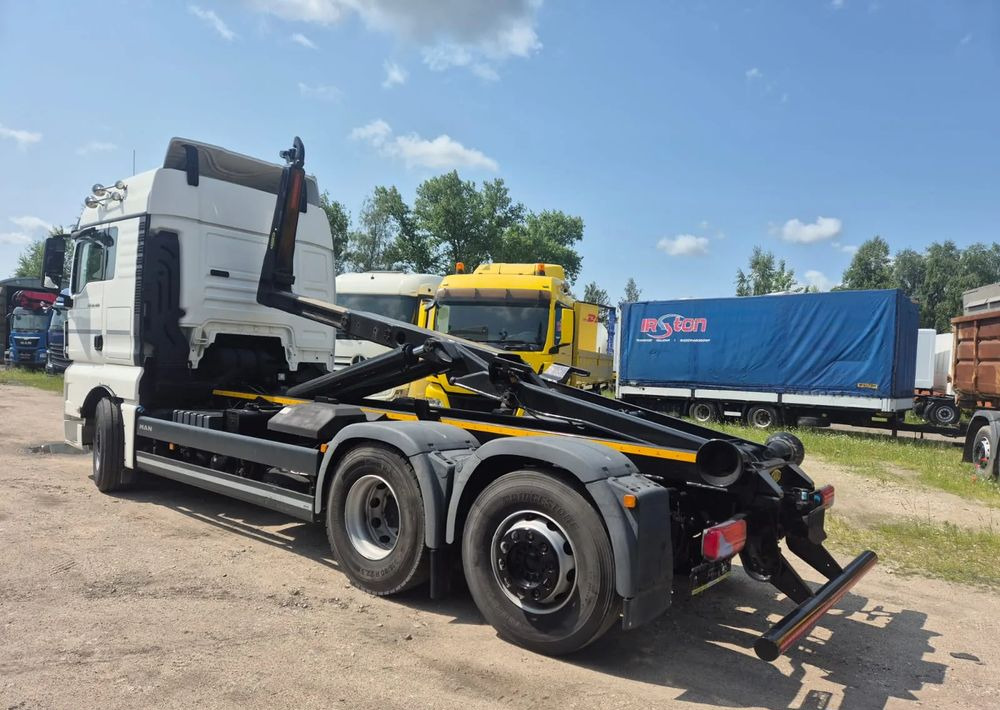 MAN TGX 26-460 Hakowiec oś skrętna - Camion ampliroll: photos 1 MAN TGX 26-460 Hakowiec oś skrętna - Camion ampliroll: photos 1