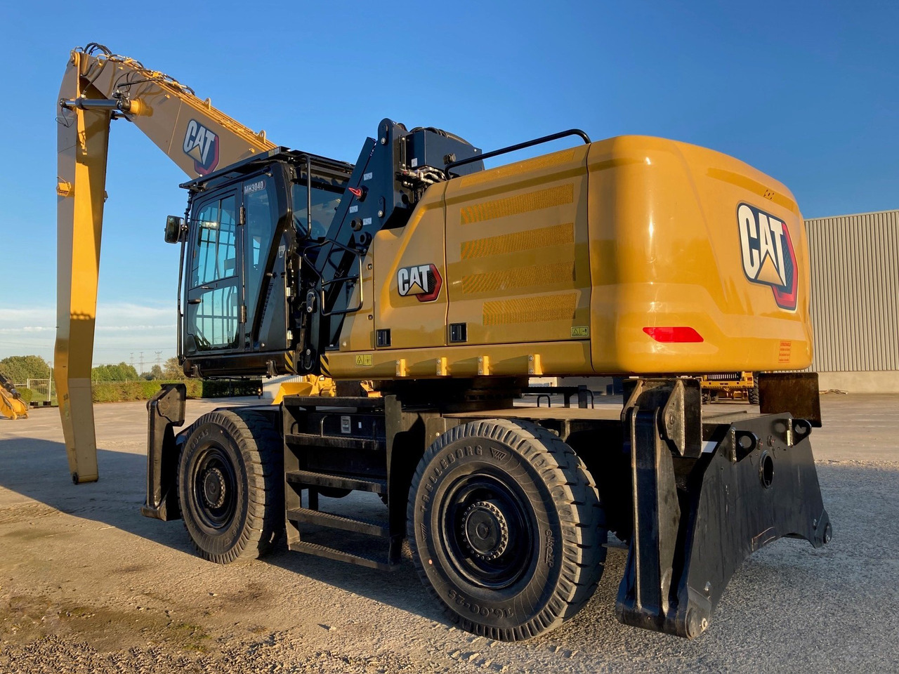 CATERPILLAR MH3040 - Pelle de manutention: photos 1 CATERPILLAR MH3040 - Pelle de manutention: photos 1