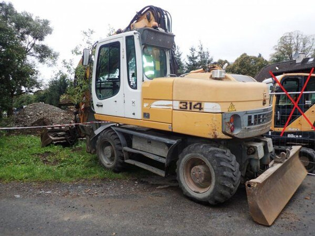 Liebherr A 314 - Pelle sur pneus: photos 3 Liebherr A 314 - Pelle sur pneus: photos 3