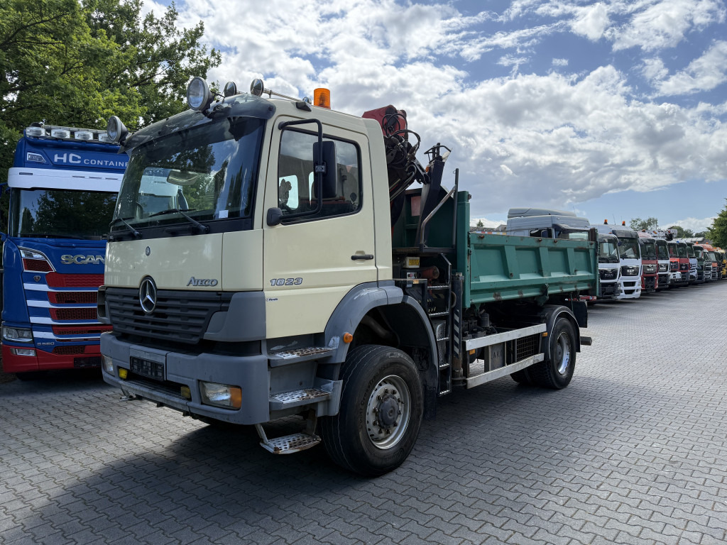 Mercedes-Benz Atego 1823 AK 4X4 Kipper Kran Palfinger PK10000 - Camion grue, Camion benne: photos 1 Mercedes-Benz Atego 1823 AK 4X4 Kipper Kran Palfinger PK10000 - Camion grue, Camion benne: photos 1