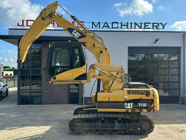Caterpillar 315DL Material Handler - Pelle sur chenille: photos 1 Caterpillar 315DL Material Handler - Pelle sur chenille: photos 1