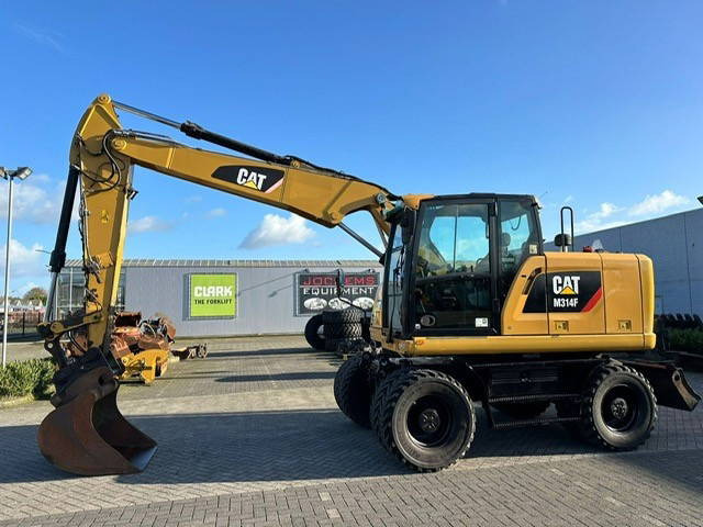 Caterpillar M314F - Pelle sur pneus: photos 1 Caterpillar M314F - Pelle sur pneus: photos 1