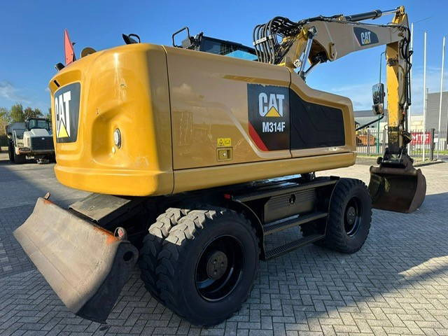 Caterpillar M314F - Pelle sur pneus: photos 4 Caterpillar M314F - Pelle sur pneus: photos 4