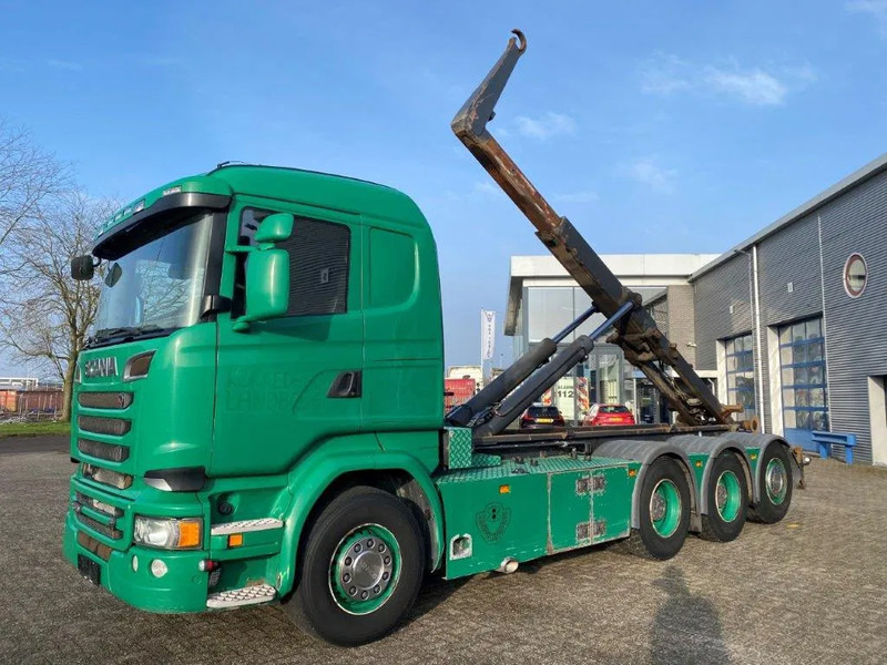 Scania R520 V8 / 8X4 / BIG AXLE / AJK HOOKLIFT 30TON / LIFT+LENKACHSE / NAVI / LEATHER / FULL-AIR / AUTOMATIC / EURO-6 / 2015 - Camion ampliroll: photos 1 Scania R520 V8 / 8X4 / BIG AXLE / AJK HOOKLIFT 30TON / LIFT+LENKACHSE / NAVI / LEATHER / FULL-AIR / AUTOMATIC / EURO-6 / 2015 - Camion ampliroll: photos 1