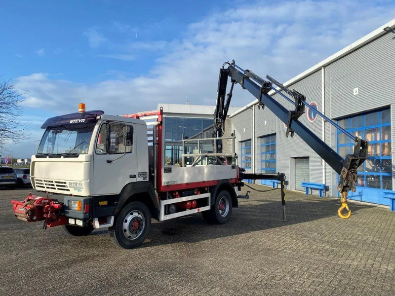 Steyr LÄRMARM 12S23 / 4X4 / CRANE HIAB 092 / WINCH / ONLY: 117406KM / TOP CONDITION / BIG AXLE / FULL STEEL+DRUM BRAKES / MANUAL / EUR - Camion grue: photos 1 Steyr LÄRMARM 12S23 / 4X4 / CRANE HIAB 092 / WINCH / ONLY: 117406KM / TOP CONDITION / BIG AXLE / FULL STEEL+DRUM BRAKES / MANUAL / EUR - Camion grue: photos 1