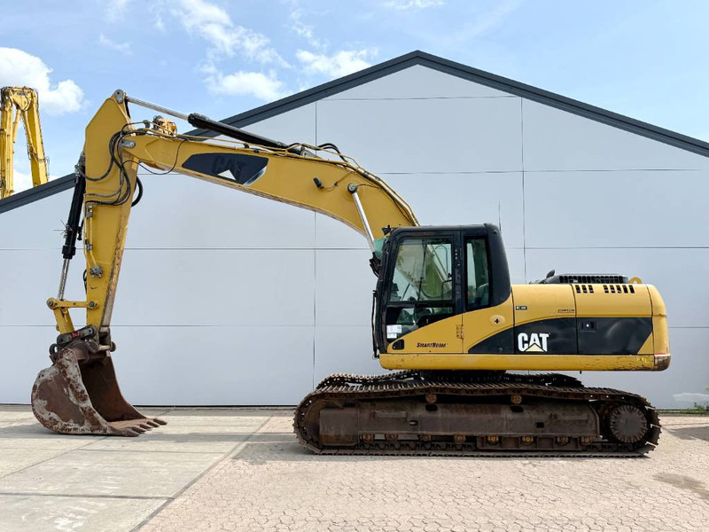 Cat 323DL - German Machine / Quick Coupler - Pelle sur chenille: photos 1 Cat 323DL - German Machine / Quick Coupler - Pelle sur chenille: photos 1