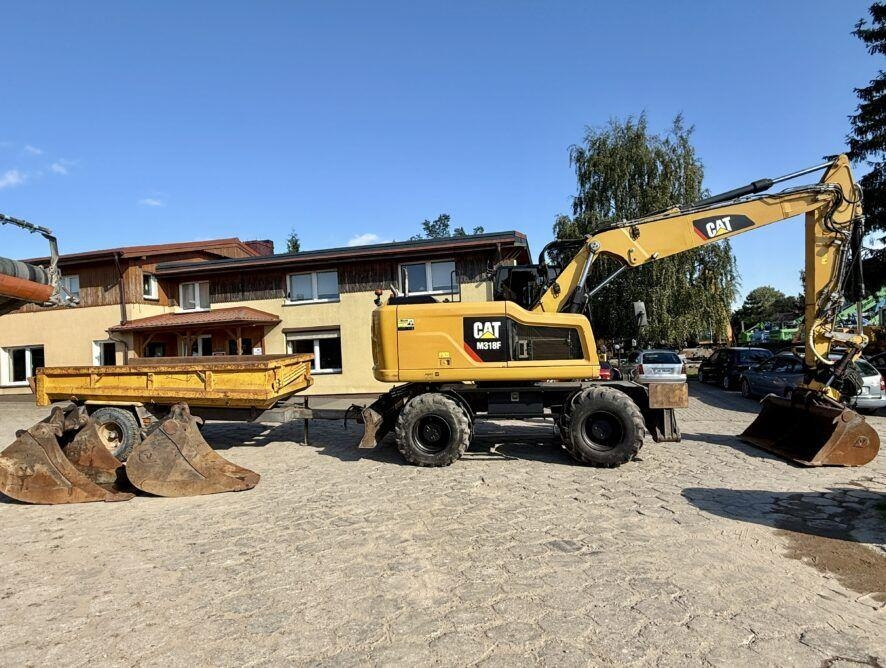 CAT M318F - Pelle sur pneus: photos 4 CAT M318F - Pelle sur pneus: photos 4