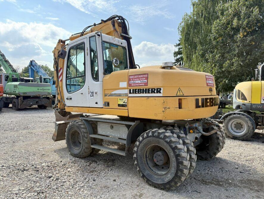 Liebherr A314 - Pelle sur pneus: photos 2 Liebherr A314 - Pelle sur pneus: photos 2