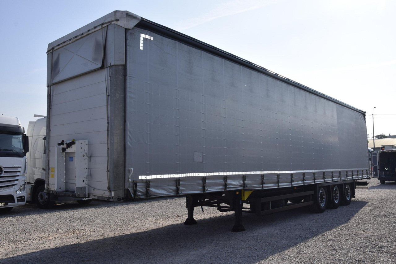 Schmitz Cargobull SCS24/L Varios - Semi-remorque rideaux coulissants: photos 1 Schmitz Cargobull SCS24/L Varios - Semi-remorque rideaux coulissants: photos 1