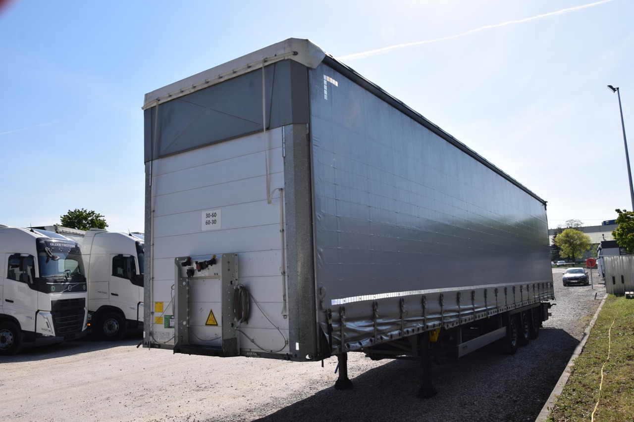 Schmitz Cargobull SCS24/L Varios - Semi-remorque rideaux coulissants: photos 1 Schmitz Cargobull SCS24/L Varios - Semi-remorque rideaux coulissants: photos 1