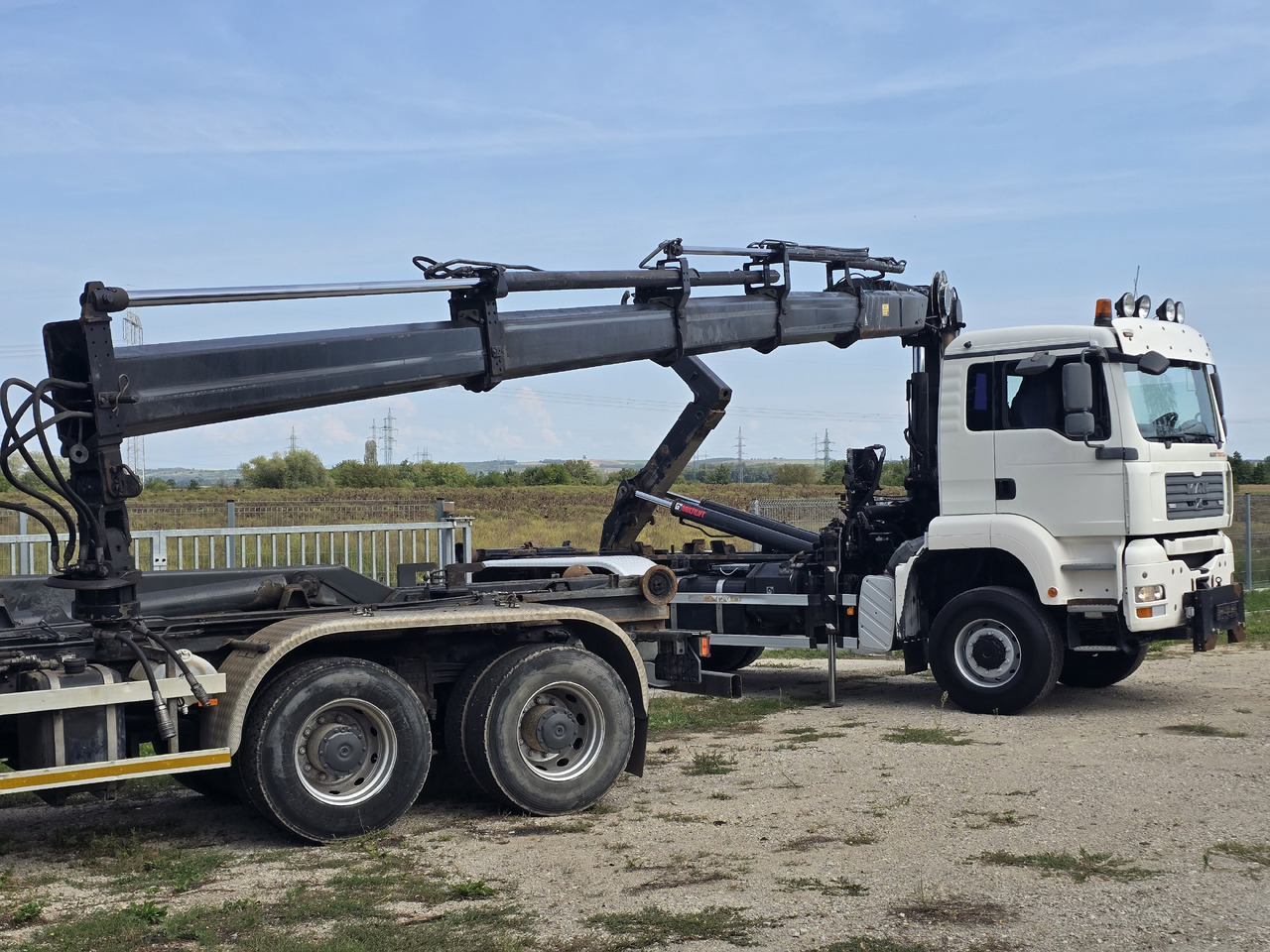 MAN TGA 26.440 6X6 / HOOK SYSTEM / HIAB 166D REMOTE - Camion ampliroll, Camion grue: photos 4 MAN TGA 26.440 6X6 / HOOK SYSTEM / HIAB 166D REMOTE - Camion ampliroll, Camion grue: photos 4