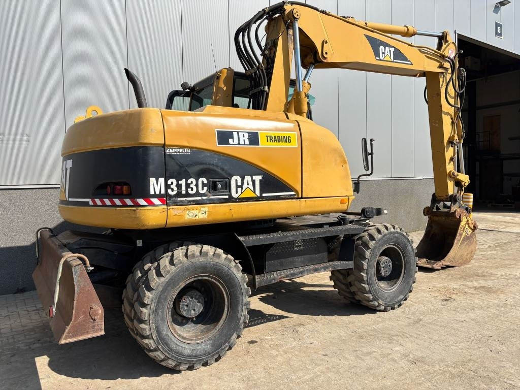 CAT M 313 C (Low verified hours) - Pelle sur pneus: photos 5 CAT M 313 C (Low verified hours) - Pelle sur pneus: photos 5