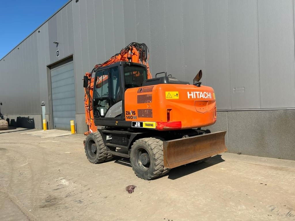 Hitachi ZX 140 W-5B - Pelle sur pneus: photos 3 Hitachi ZX 140 W-5B - Pelle sur pneus: photos 3