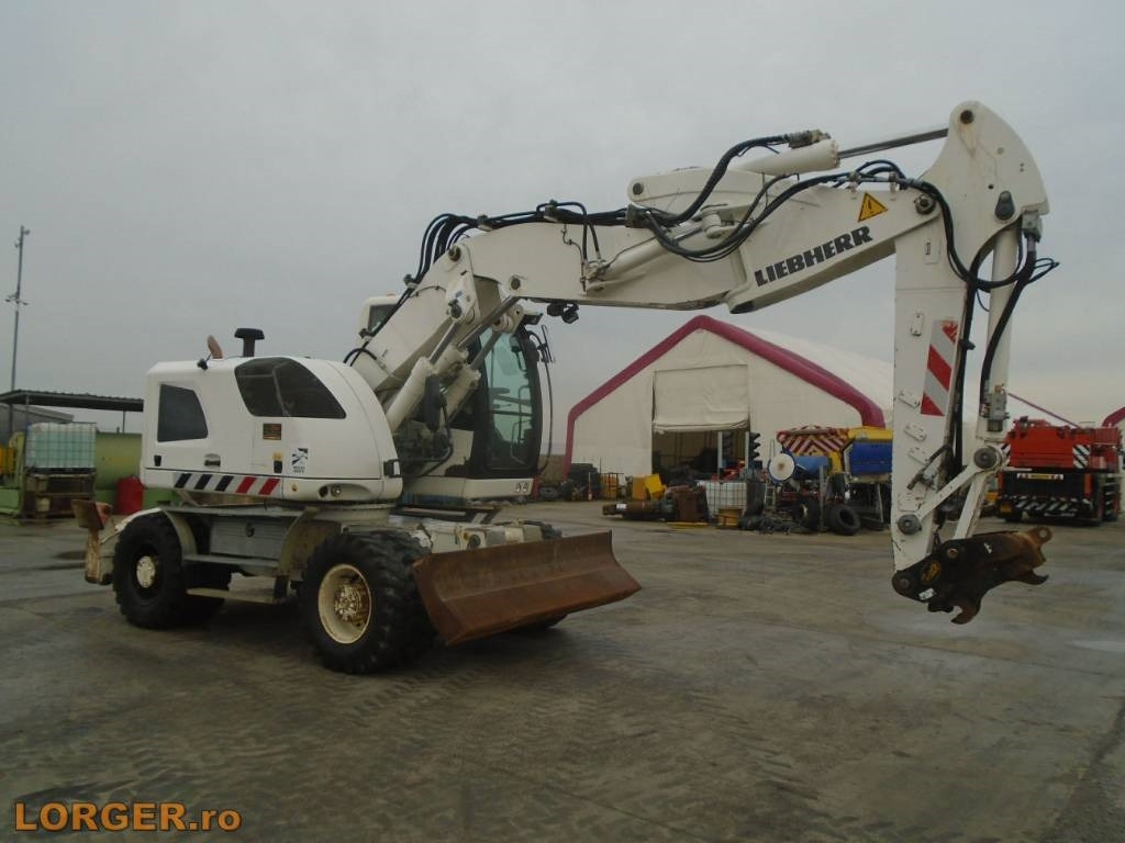 Liebherr A 918 Compact - Pelle sur pneus: photos 4 Liebherr A 918 Compact - Pelle sur pneus: photos 4