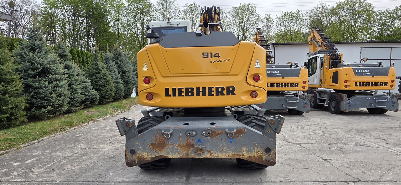 Pelle sur pneus Liebherr A 914 COMPACT: photos 8