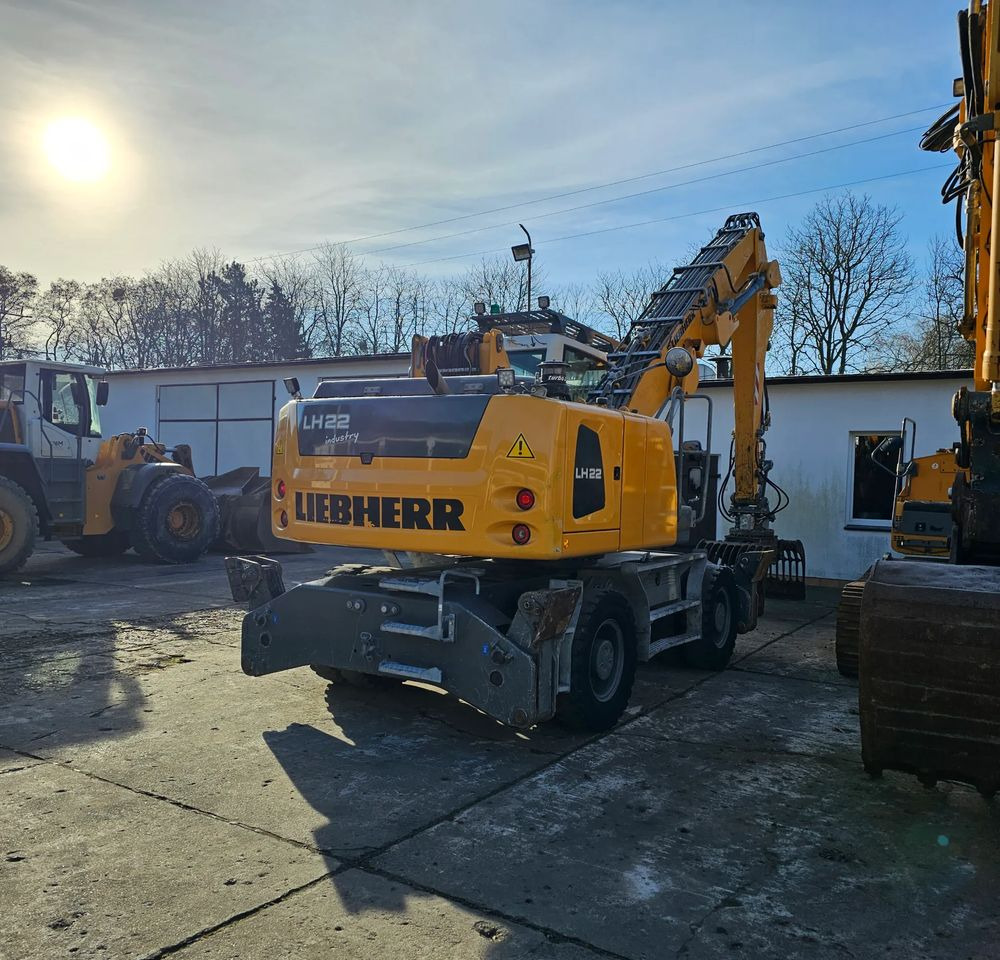 Liebherr LH22 M - Pelle sur pneus: photos 1 Liebherr LH22 M - Pelle sur pneus: photos 1