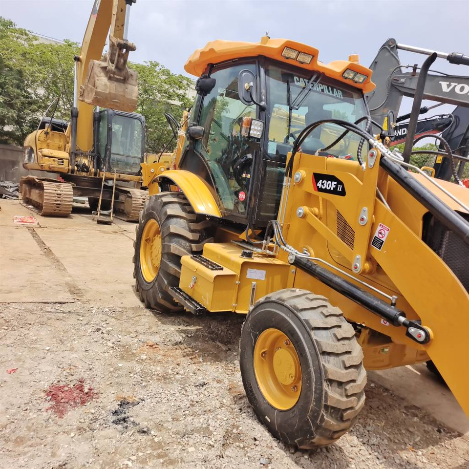 CAT 430 F 100% New - Tractopelle: photos 1 CAT 430 F 100% New - Tractopelle: photos 1