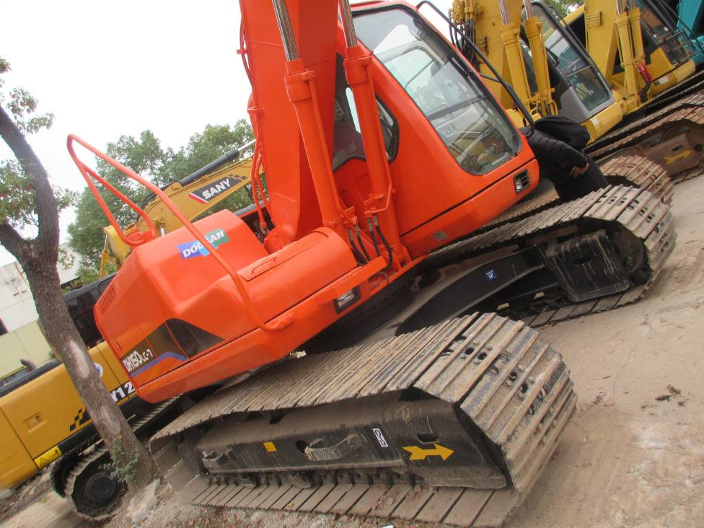 Doosan DH 150 LC-7 - Pelle sur pneus: photos 3 Doosan DH 150 LC-7 - Pelle sur pneus: photos 3