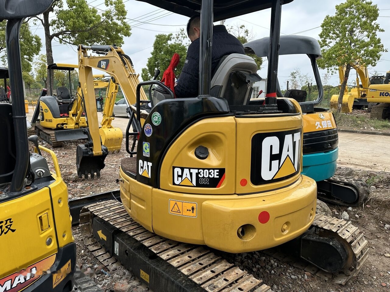 Caterpillar 303E - Mini pelle: photos 1 Caterpillar 303E - Mini pelle: photos 1