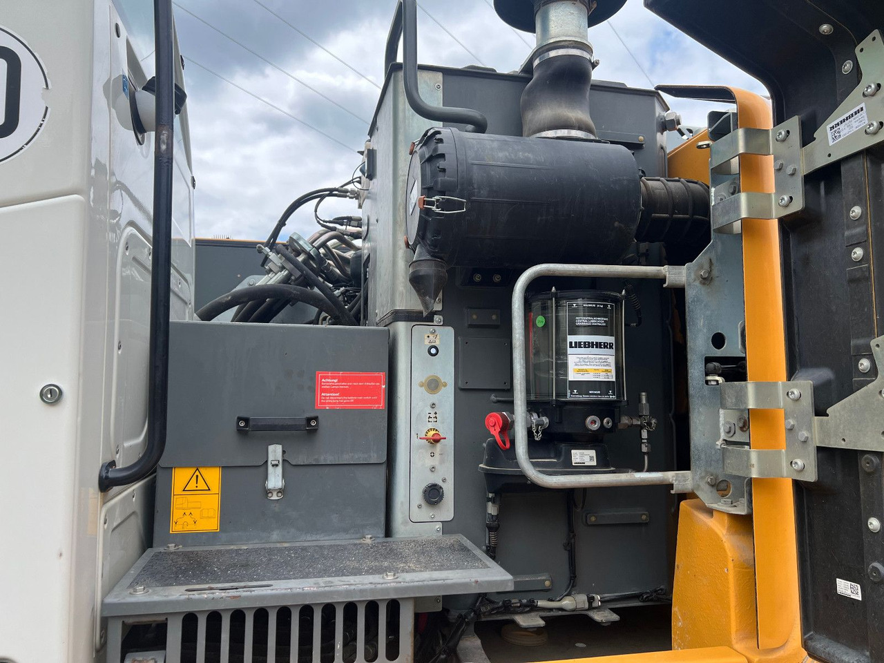Liebherr A 918 Compact Likufix SW 48 - Pelle sur pneus: photos 2 Liebherr A 918 Compact Likufix SW 48 - Pelle sur pneus: photos 2