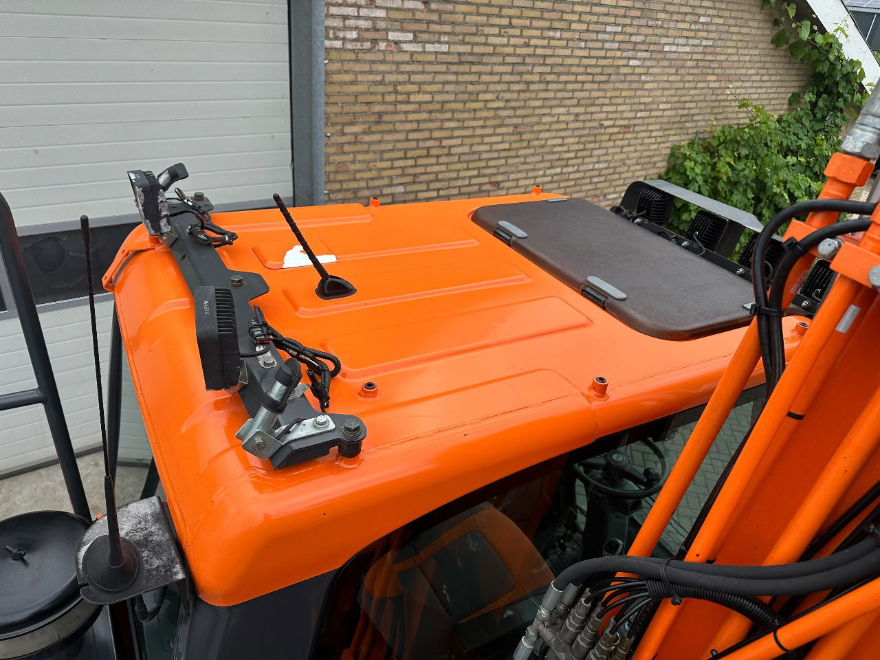 Pelle sur pneus Doosan DX140W-5: photos 28