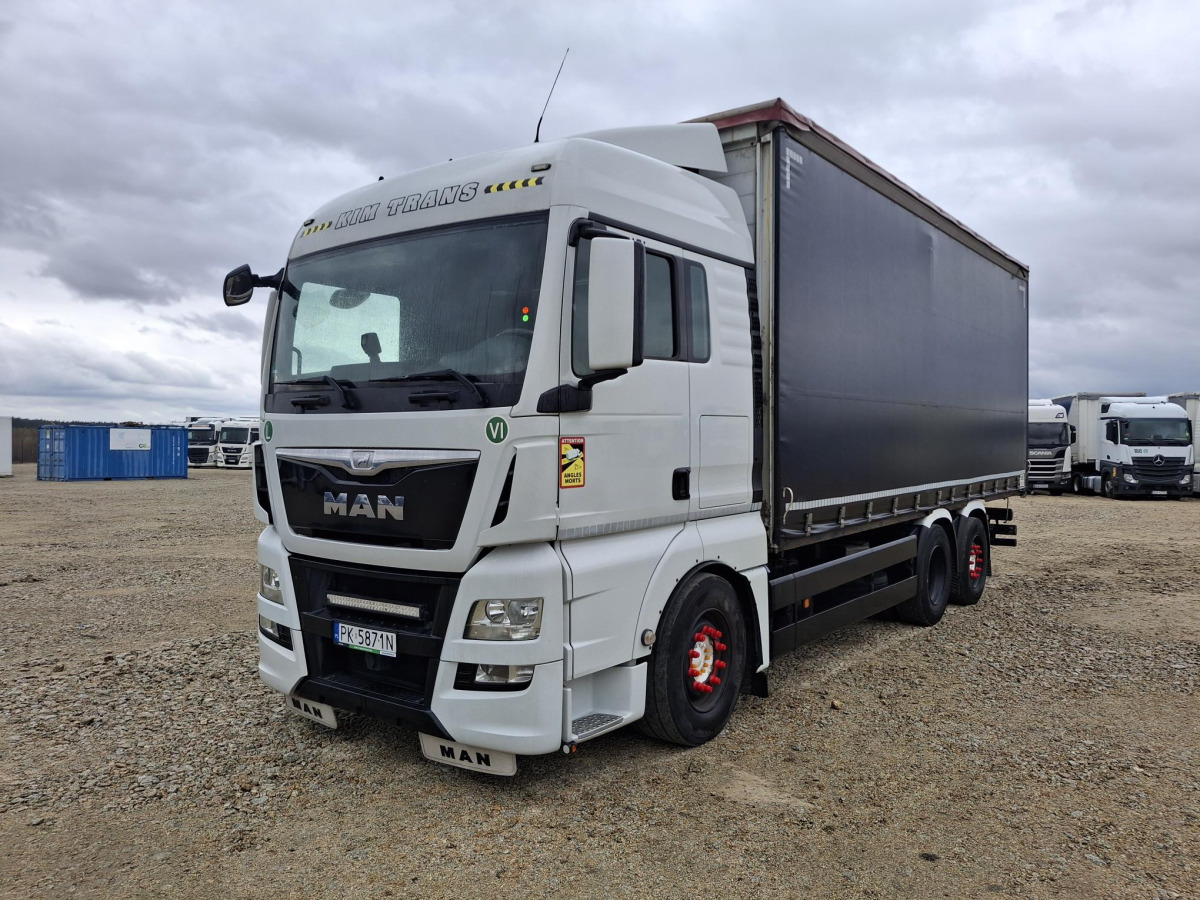 MAN TGX SOLÓWKA - Camion à rideaux coulissants: photos 2 MAN TGX SOLÓWKA - Camion à rideaux coulissants: photos 2