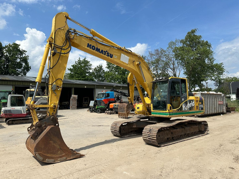 Komatsu HB 215 LC-1 - Pelle sur chenille: photos 1 Komatsu HB 215 LC-1 - Pelle sur chenille: photos 1