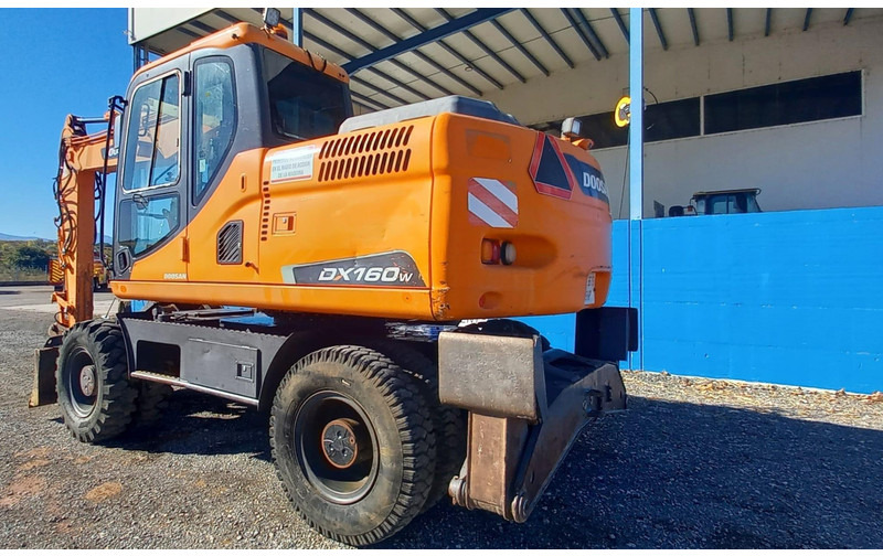 Doosan DX140W-3 - Pelle sur pneus: photos 3 Doosan DX140W-3 - Pelle sur pneus: photos 3