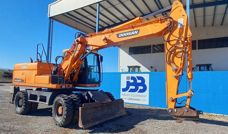 Pelle sur pneus Doosan DX140W-3: photos 6