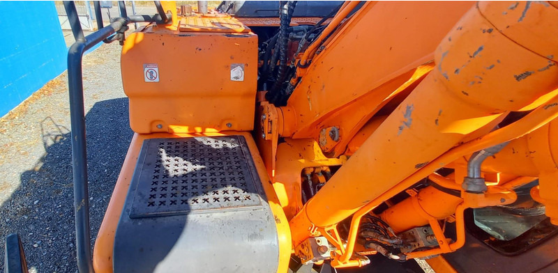 Pelle sur pneus Doosan DX140W-3: photos 10