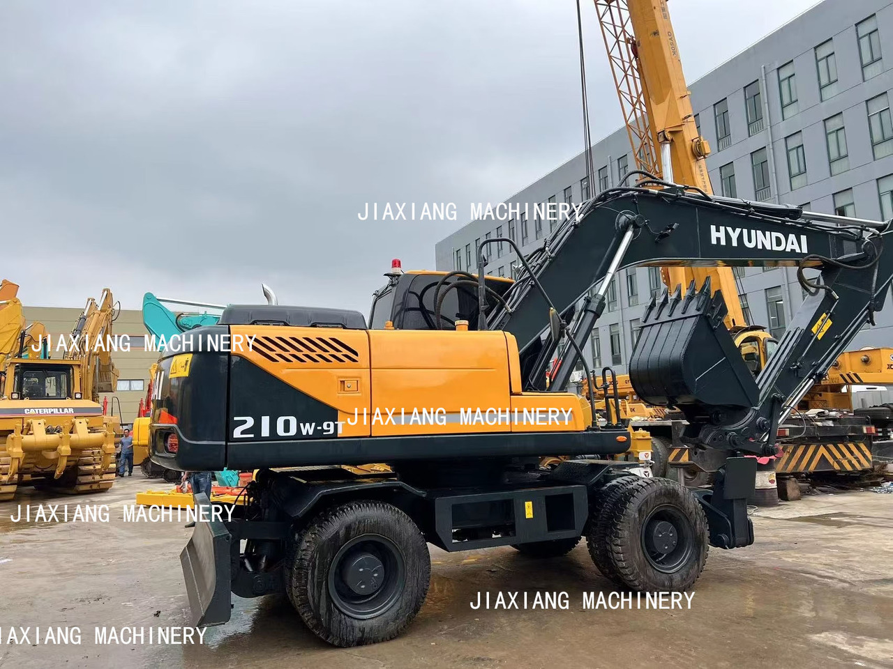 Hyundai 210w-9 wheel excavator - Pelle sur pneus: photos 5 Hyundai 210w-9 wheel excavator - Pelle sur pneus: photos 5