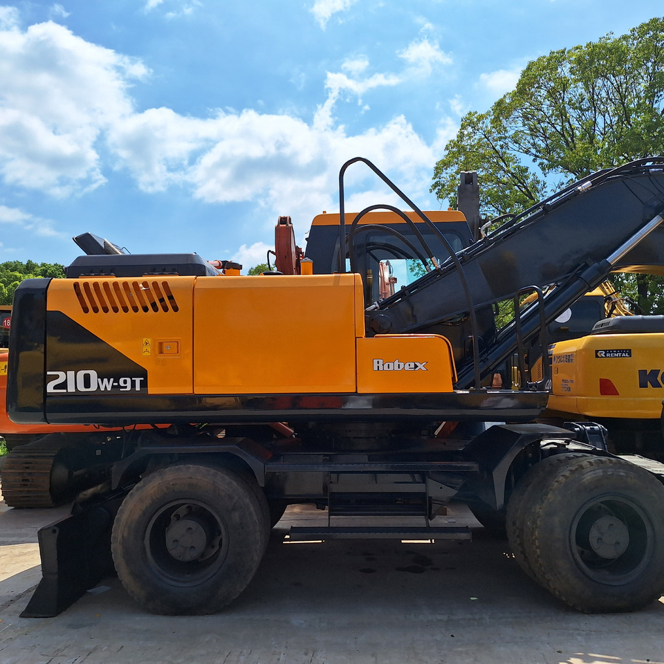 Hyundai 210w-9 wheel excavator - Pelle sur pneus: photos 3 Hyundai 210w-9 wheel excavator - Pelle sur pneus: photos 3