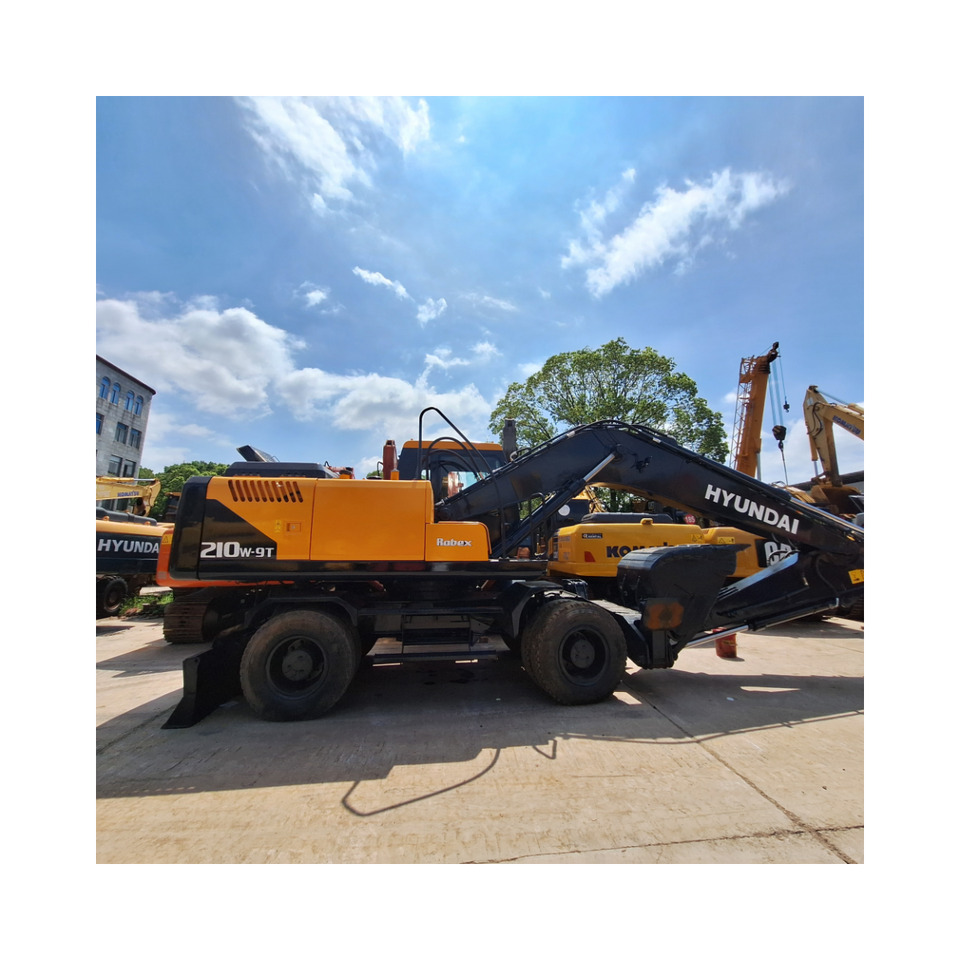 Hyundai 210w-9 wheel excavator - Pelle sur pneus: photos 2 Hyundai 210w-9 wheel excavator - Pelle sur pneus: photos 2