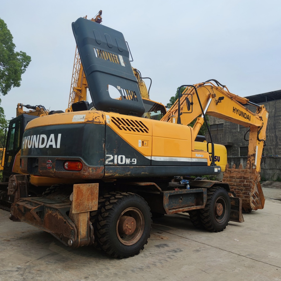 Hyundai 210w-9 wheel excavator - Pelle sur pneus: photos 4 Hyundai 210w-9 wheel excavator - Pelle sur pneus: photos 4
