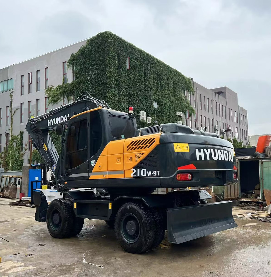 Hyundai 210w-9 wheel excavator - Pelle sur pneus: photos 3 Hyundai 210w-9 wheel excavator - Pelle sur pneus: photos 3