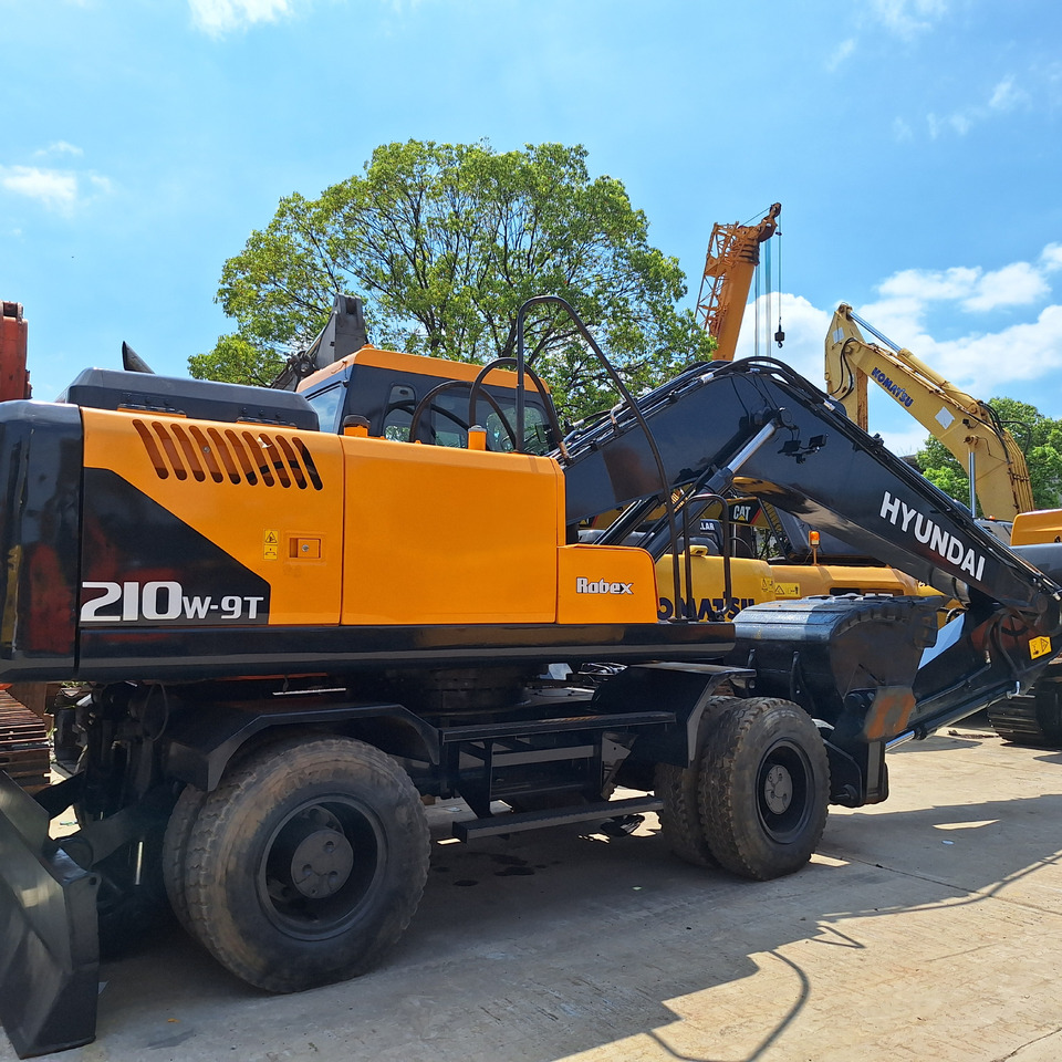 Hyundai 210w-9T wheel excavator - Pelle sur pneus: photos 4 Hyundai 210w-9T wheel excavator - Pelle sur pneus: photos 4