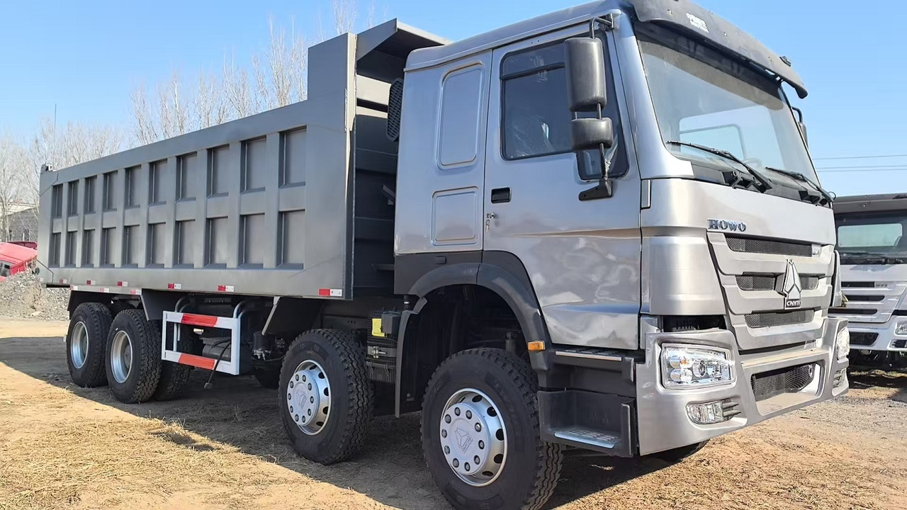 SINOTRUK Howo Dump truck 371hp 8x4 - Camion benne: photos 1 SINOTRUK Howo Dump truck 371hp 8x4 - Camion benne: photos 1