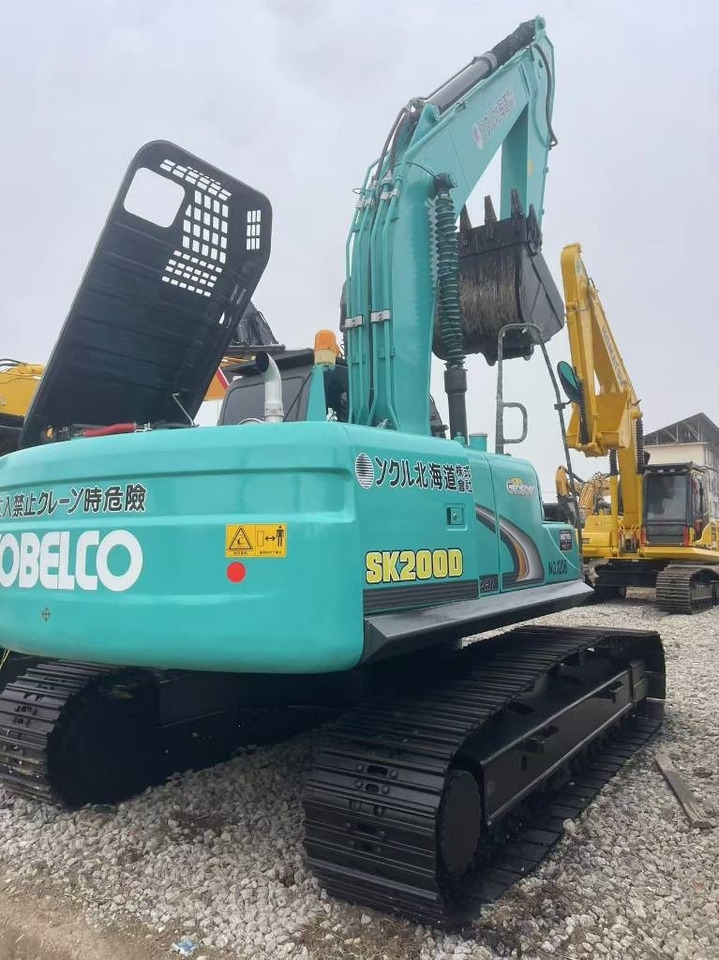 Kobelco SK 200 - Pelle sur chenille: photos 1 Kobelco SK 200 - Pelle sur chenille: photos 1