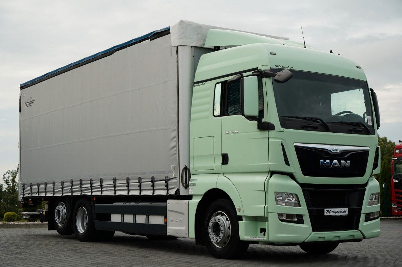 MAN TGX 26.440 / 6x2 / FIRANKA - 8,15 m / SOLÓWKA / MAN TGX 26.440 / 6x2 / FIRANKA - 8,15 m / SOLÓWKA / - Camion à rideaux coulissants: photos 1 MAN TGX 26.440 / 6x2 / FIRANKA - 8,15 m / SOLÓWKA / MAN TGX 26.440 / 6x2 / FIRANKA - 8,15 m / SOLÓWKA / - Camion à rideaux coulissants: photos 1
