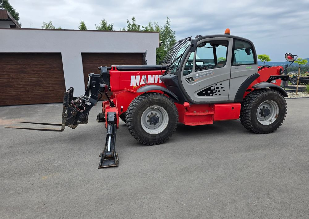 Manitou MT 1440 EASY - Chariot télescopique: photos 1 Manitou MT 1440 EASY - Chariot télescopique: photos 1