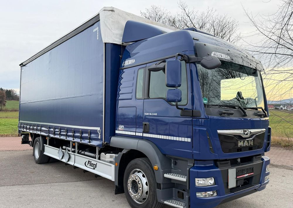 MAN TGM 18.340 / FIRANKA / LIFT / SPROWADZONY / KLIMA POSTOJOWA / 2017 / 9700 ŁADOWNOŚĆ / AUTOMAT / 18 PALET / E6 / WINDA / - Camion à rideaux coulissants: photos 1 MAN TGM 18.340 / FIRANKA / LIFT / SPROWADZONY / KLIMA POSTOJOWA / 2017 / 9700 ŁADOWNOŚĆ / AUTOMAT / 18 PALET / E6 / WINDA / - Camion à rideaux coulissants: photos 1