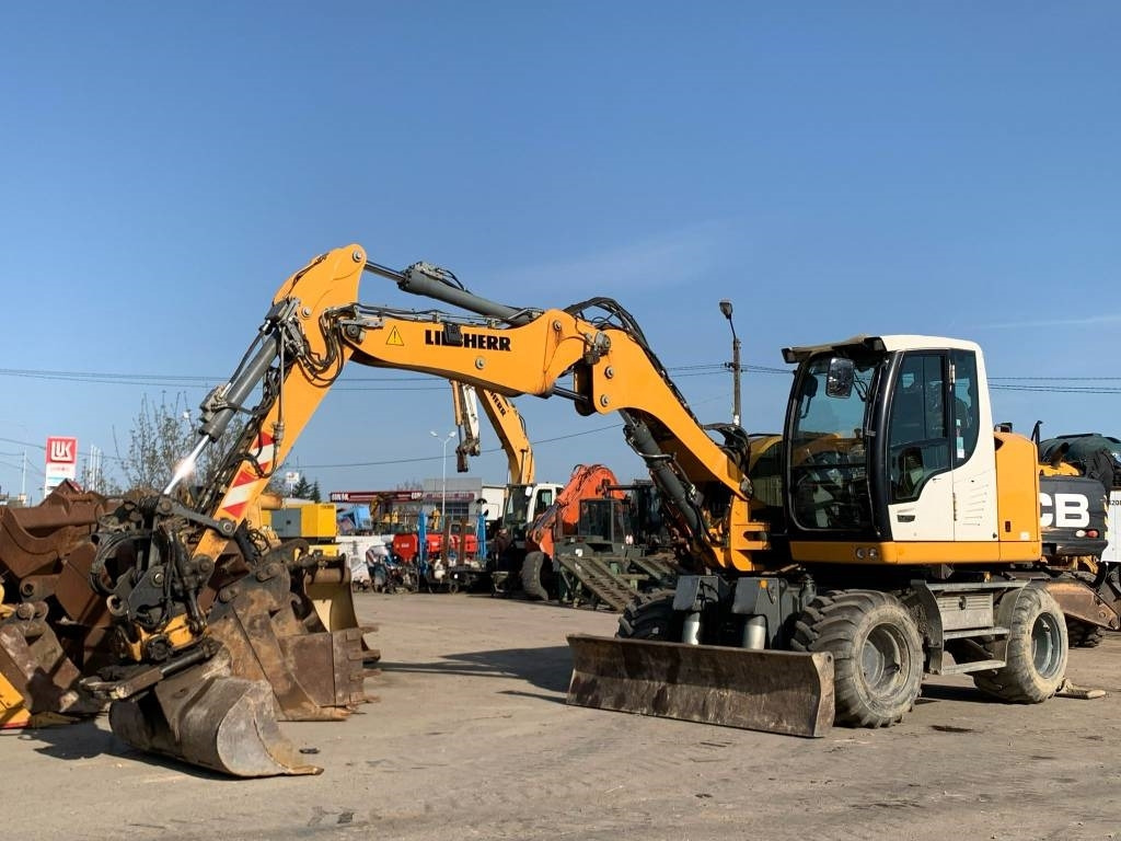 Liebherr A912 Compact+Engcon Rototilt - Pelle sur pneus: photos 1 Liebherr A912 Compact+Engcon Rototilt - Pelle sur pneus: photos 1