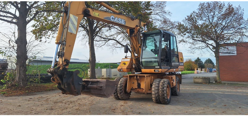 Case WX150 - Pelle sur pneus: photos 2 Case WX150 - Pelle sur pneus: photos 2