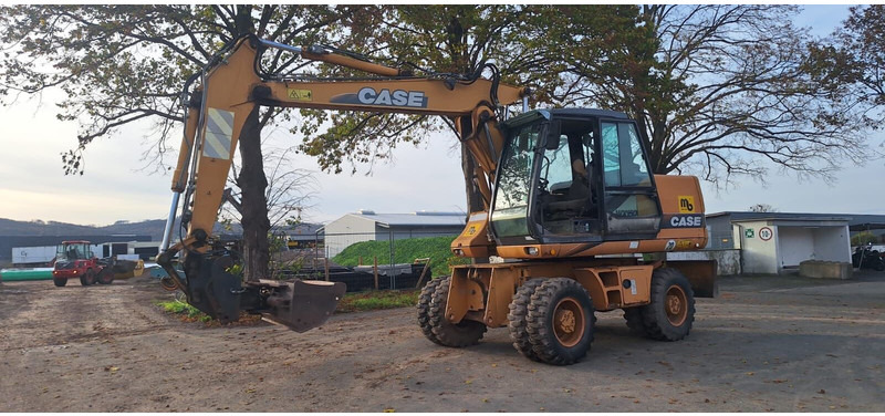 Case WX150 - Pelle sur pneus: photos 1 Case WX150 - Pelle sur pneus: photos 1