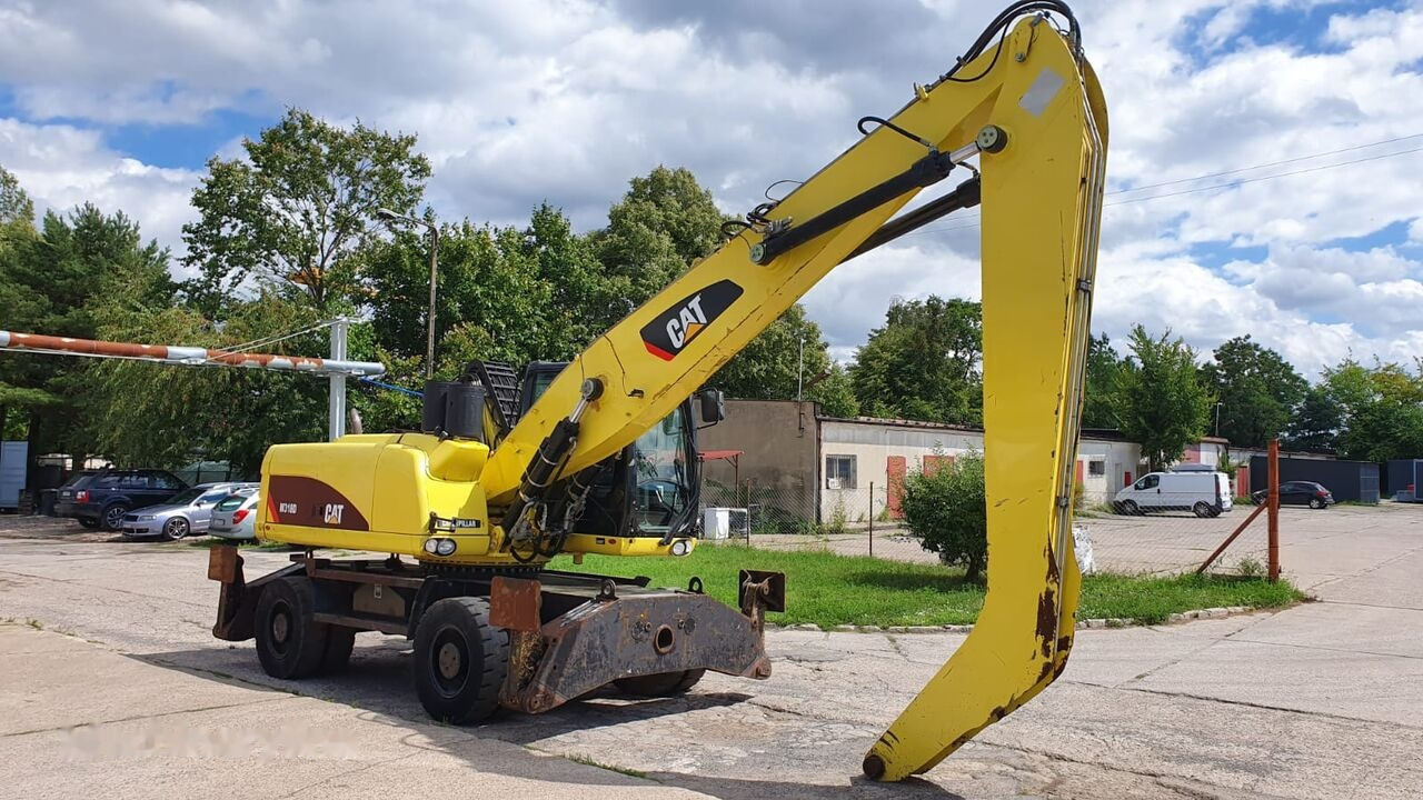 Caterpillar M 318 D MH - Pelle de manutention: photos 5 Caterpillar M 318 D MH - Pelle de manutention: photos 5